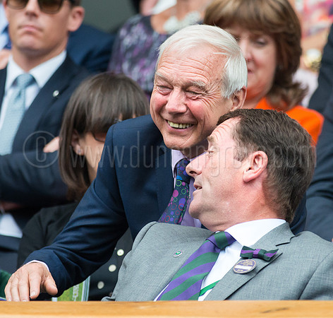 Wimbledon Tennis 24.06.2014. John Humphries chats with Phil Brookes in the Royal Box.