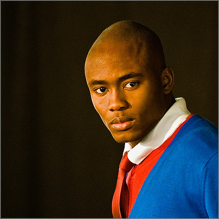 Red Tie. Portrait of a fashionable young black man.