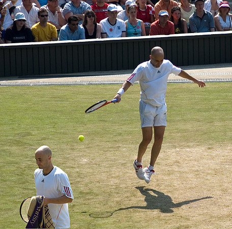 Agassi Leaving - both the ball & Wimbledon for the last time. Centre Court, Wimbledon 2006.